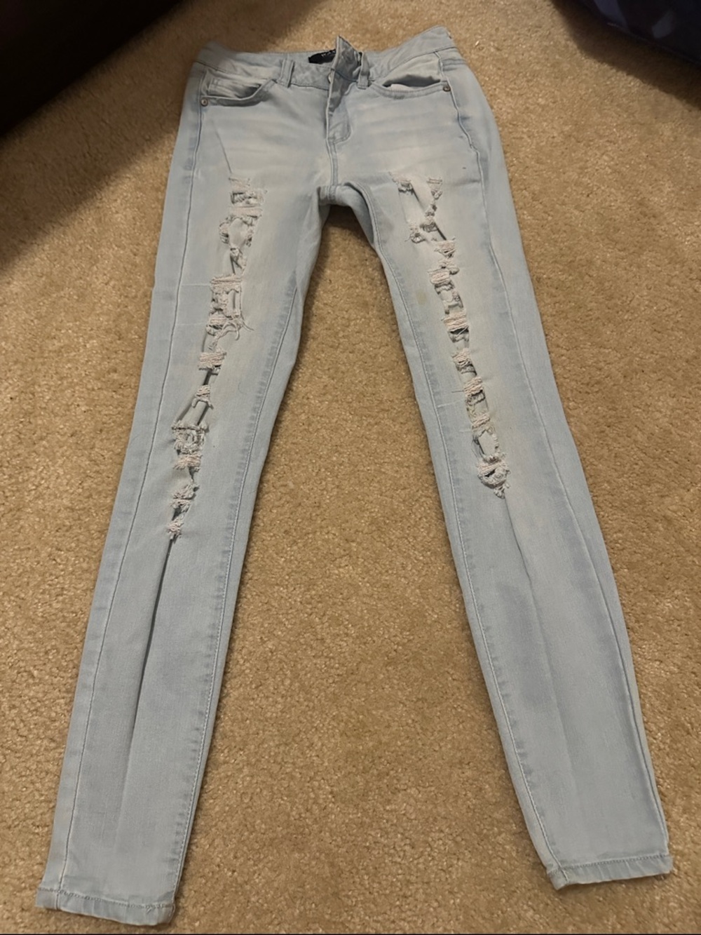 Light Blue Distressed Skinny Jeans - Women's